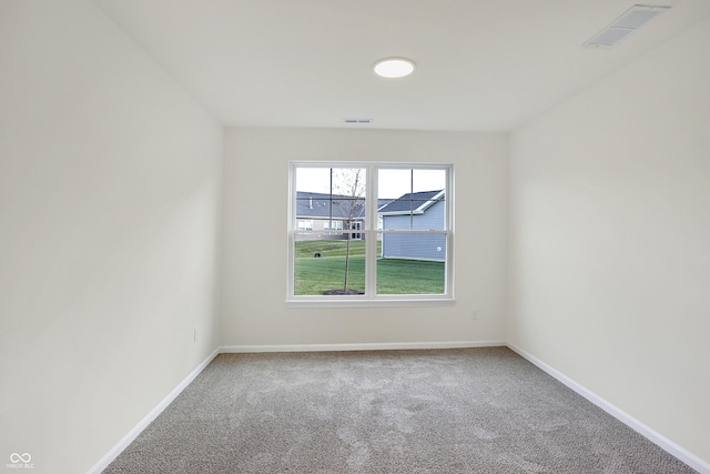 view of carpeted spare room