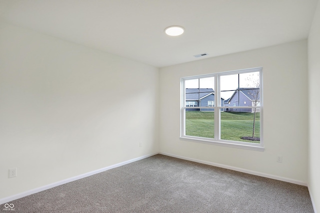 unfurnished room featuring carpet floors