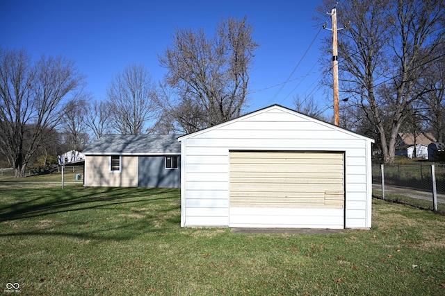 garage with a lawn