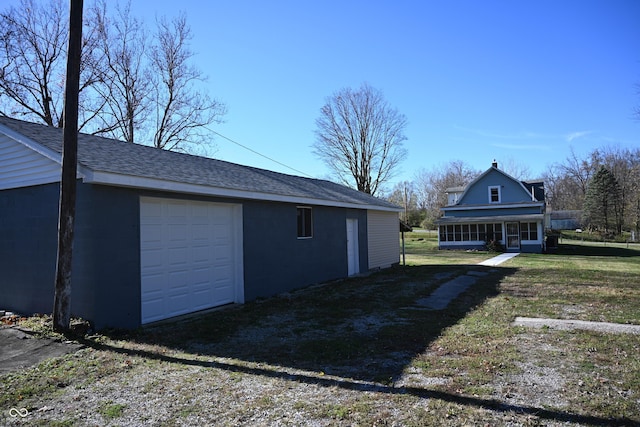 garage with a yard