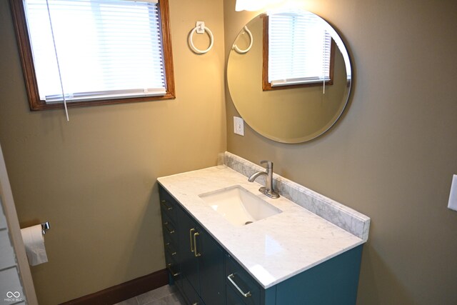 bathroom featuring vanity and a healthy amount of sunlight