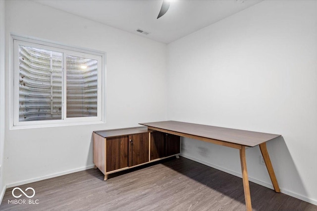 7650 Clarion Dr, Indianapolis, IN 46236 - unfurnished office with wood finished floors, baseboards, and a ceiling fan