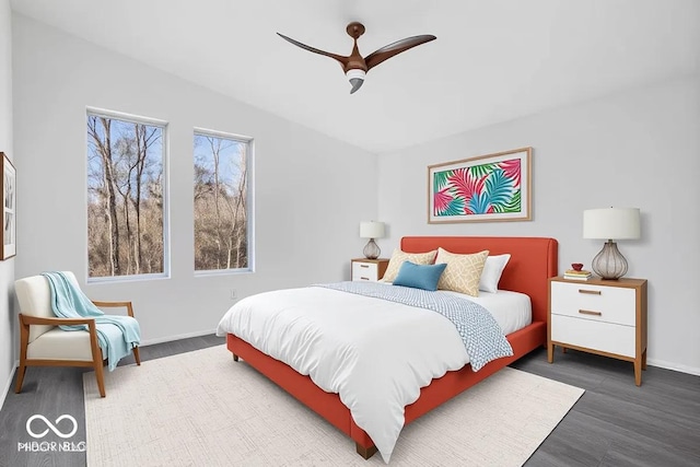 7650 Clarion Dr, Indianapolis, IN 46236 - bedroom with wood finished floors, baseboards, and a ceiling fan