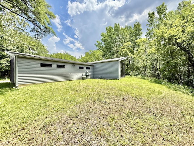 7650 Clarion Dr, Indianapolis, IN 46236 - rear view of property with a lawn