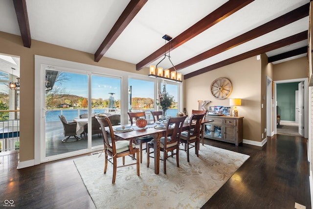 dining room with vaulted ceiling with beams, a water view, dark hardwood / wood-style floors, and an inviting chandelier