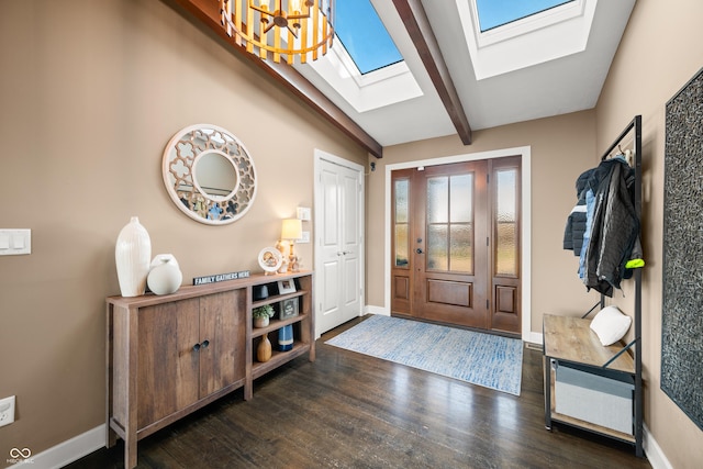 entrance foyer featuring vaulted ceiling with beams and dark wood-type flooring