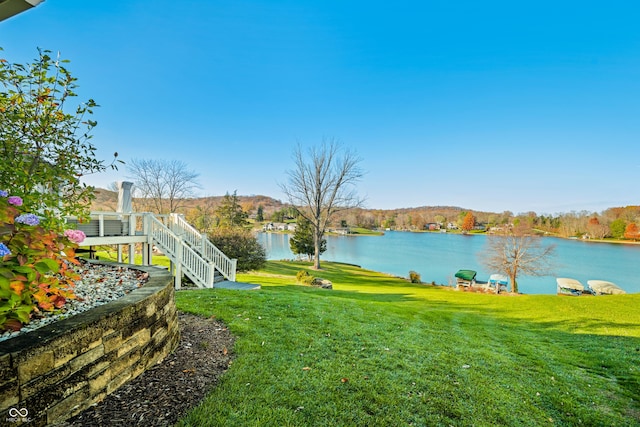 view of yard with a water view