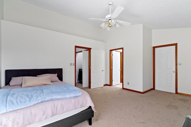 bedroom featuring light carpet, ceiling fan, and lofted ceiling