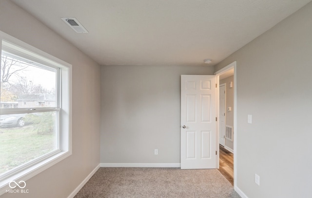 empty room with light carpet