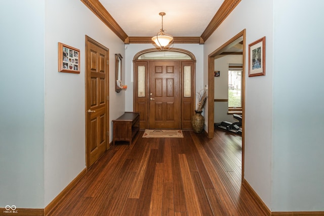 entryway featuring dark hardwood / wood-style flooring and ornamental molding