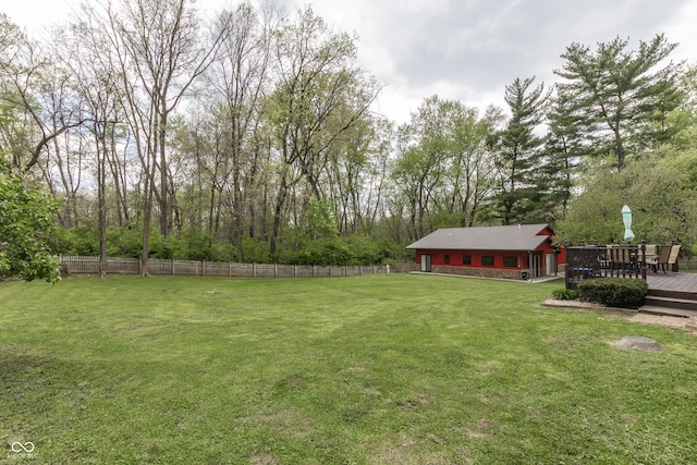 view of yard featuring a deck