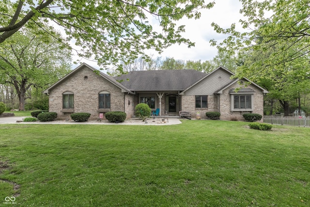 view of front of property with a front lawn