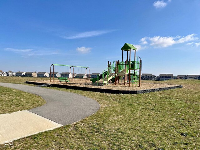 view of play area featuring a lawn