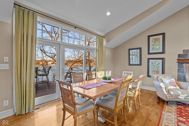 dining area with light hardwood / wood-style floors