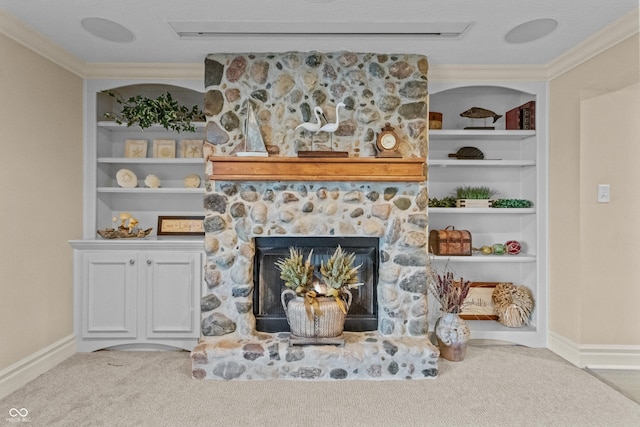 living room with a fireplace, carpet floors, built in features, and ornamental molding