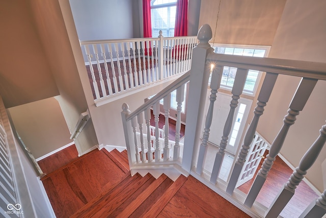 stairway with wood-type flooring