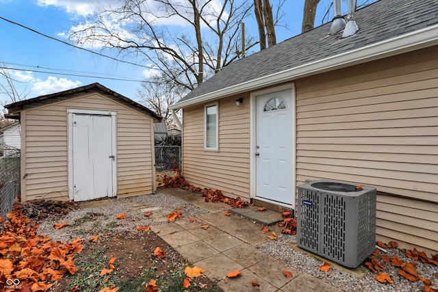 view of outbuilding featuring central AC unit