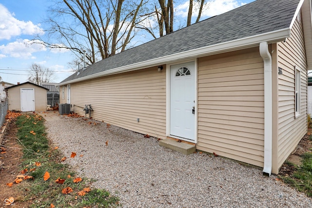 view of exterior entry with central AC