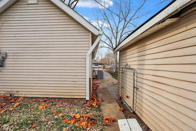 view of home's exterior with central AC