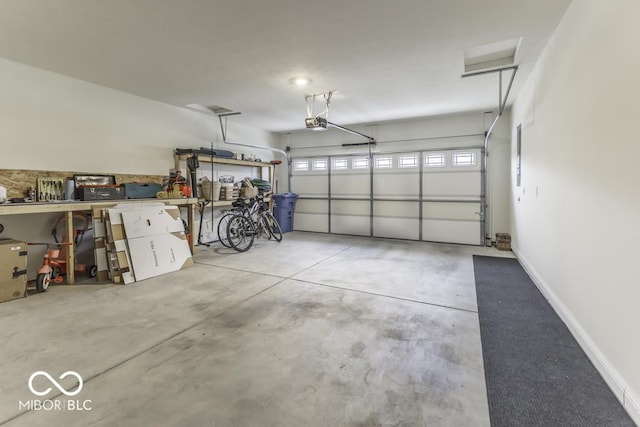 garage featuring a garage door opener