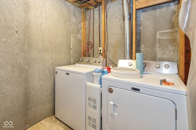 washroom featuring separate washer and dryer