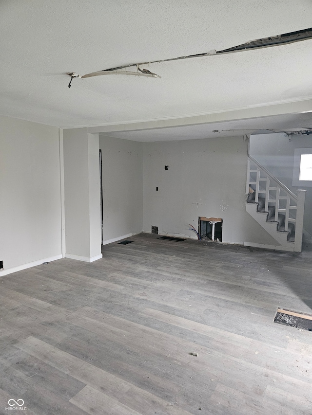 unfurnished room featuring hardwood / wood-style floors