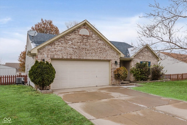 view of front of house featuring a garage, central air condition unit, and a front lawn