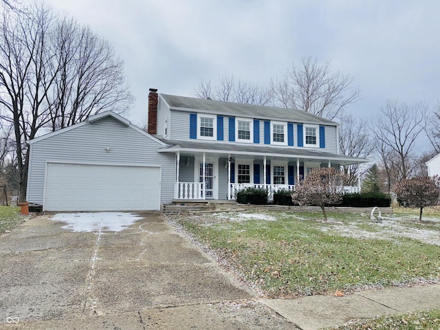 view of front facade with a porch and a garage