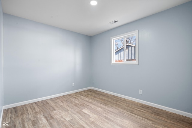 empty room with light wood-type flooring