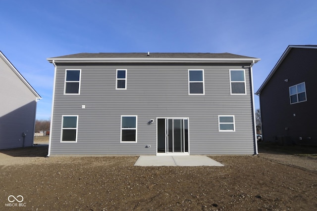 back of property with a patio area