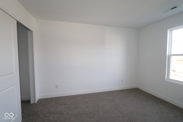 view of carpeted spare room