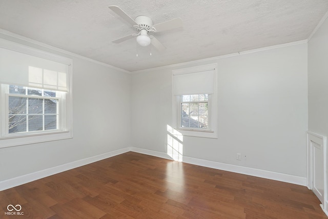 empty room featuring hardwood / wood-style floors, ceiling fan, crown molding, and a textured ceiling