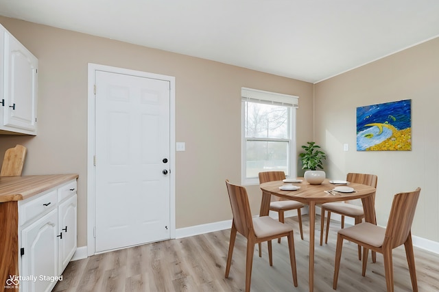 dining area featuring light hardwood / wood-style flooring