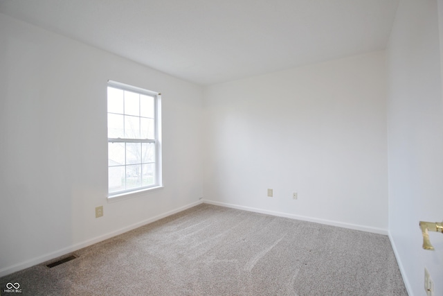 empty room featuring carpet flooring