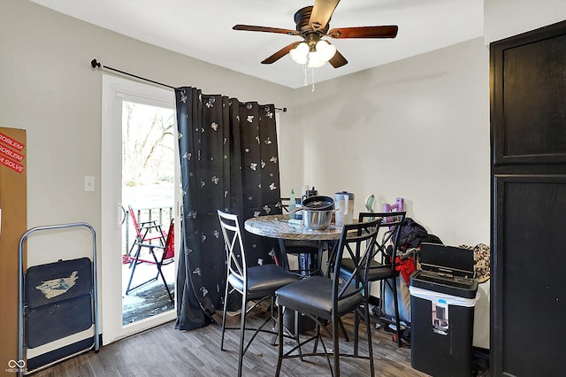 dining space featuring hardwood / wood-style floors and ceiling fan