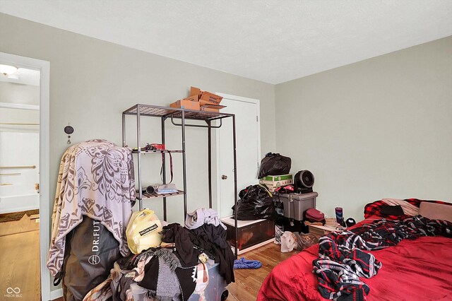 bedroom featuring hardwood / wood-style floors