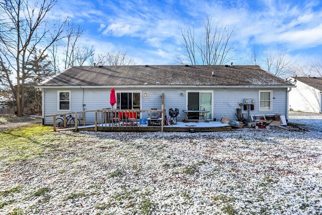 rear view of house with a deck