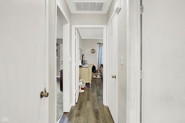 hall with dark hardwood / wood-style floors