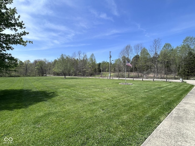 9695 S Houston Rd, Freetown, IN 47235 - surrounding community featuring a yard