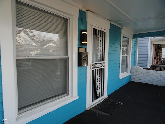 entrance to property with a porch