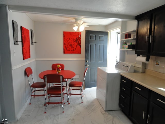 kitchen with tasteful backsplash, washer / clothes dryer, and ceiling fan