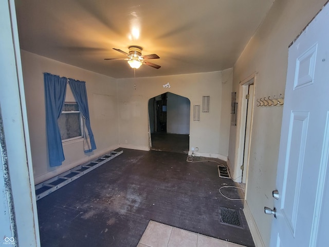 unfurnished room featuring ceiling fan