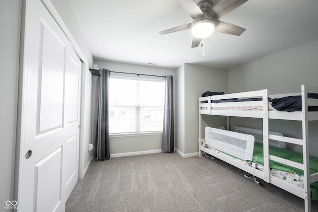 unfurnished bedroom with carpet and ceiling fan