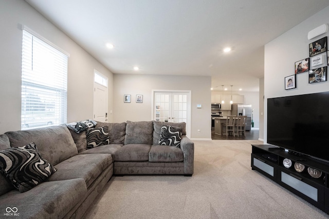 living room with light colored carpet