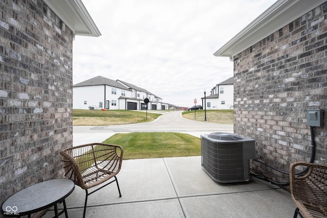 view of patio with central AC