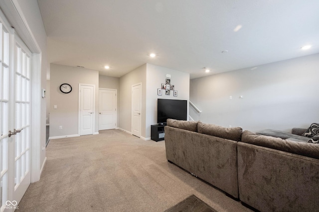 living room with light carpet