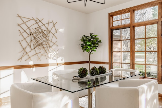 unfurnished dining area featuring wood finished floors