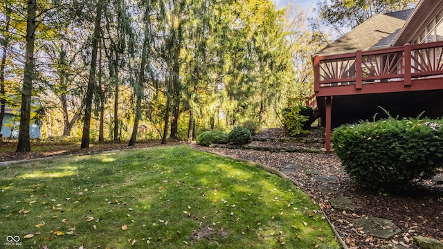 view of yard with a wooden deck