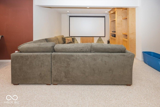 home theater room featuring carpet flooring