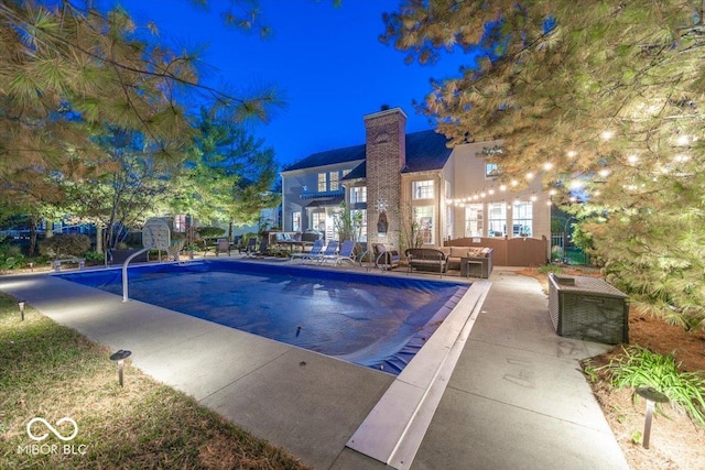 view of swimming pool featuring a patio area and outdoor lounge area